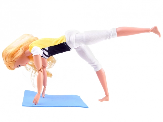 Gymnastikpuppe beim Yoga und Fitness