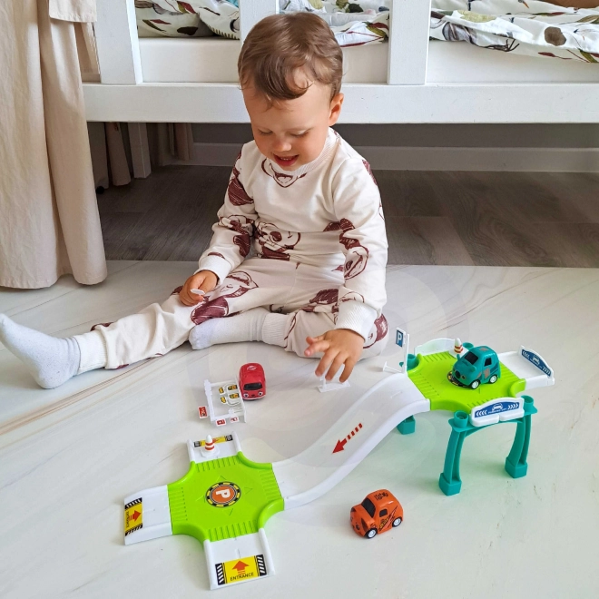 Woopie parkhaus mit tankstelle und spielzeugautos