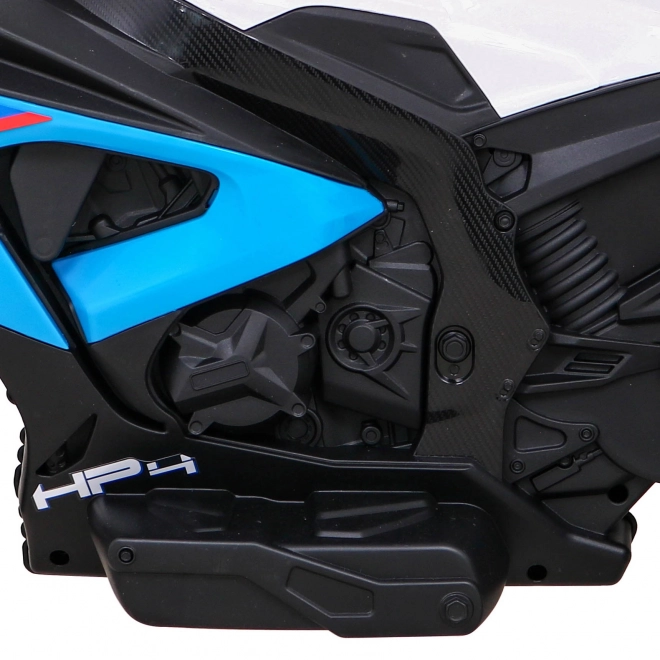 BMW HP4 Kinder Motorrad mit Batterie Blau + 3 Räder + LED + MP3 USB + Öko-Leder