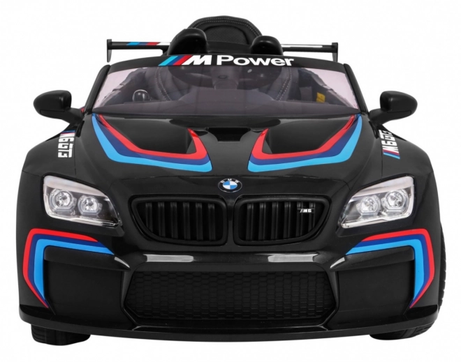 BMW M6 GT3 Spielzeugauto auf Batterie für Kinder schwarz + Belüftung + MP3-Sounds Lichter + Fernbedienung