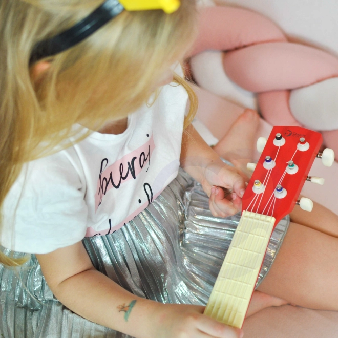 Holzspielzeug Gitarre mit Plektrum