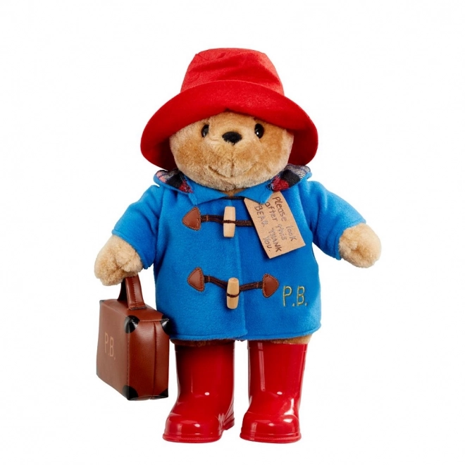 Paddington Bär mit Stiefeln und Koffer