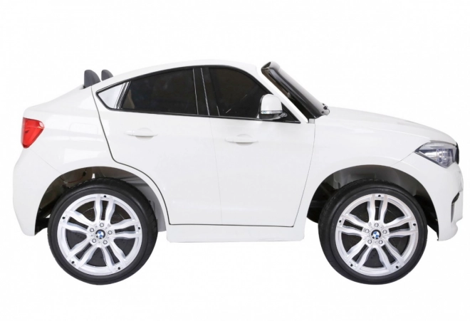 BMW X6M XXL pro 2 Kinder Weiß + Fernsteuerung + Eco-Leder + Sicherheitsgurte + langsamer Start + MP3 USB + LED
