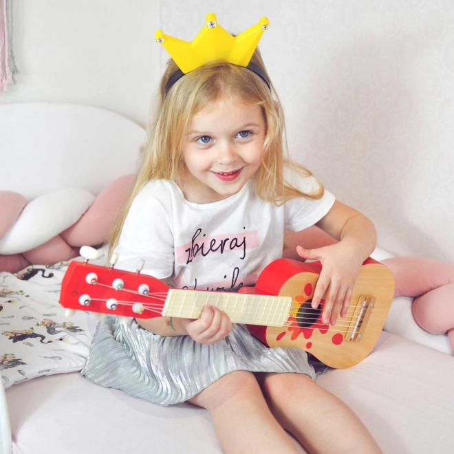Holzspielzeug Gitarre mit Plektrum