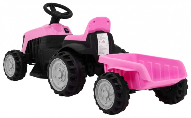 Grüner Traktor mit Anhänger – rosa