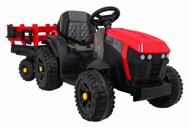 Titan-Traktor mit rotem Anhänger