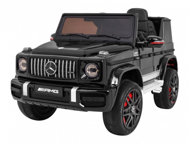 Mercedes AMG G63 für Kinder Lack schwarz + Fernbedienung + MP3 LED + langsamer Start + EVA + Gurte