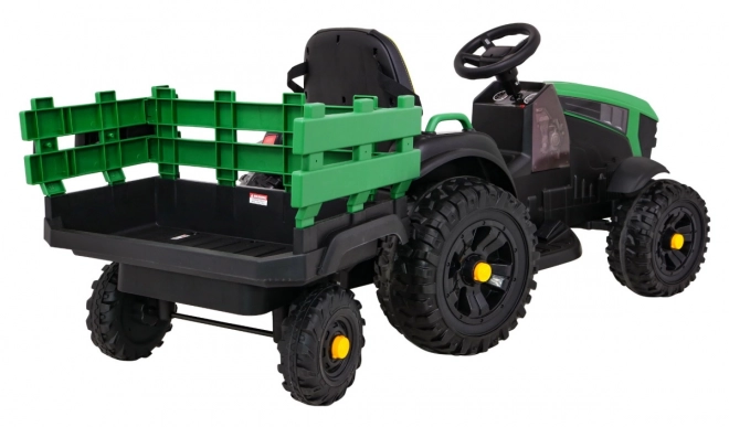 Titantraktor mit Anhänger grün