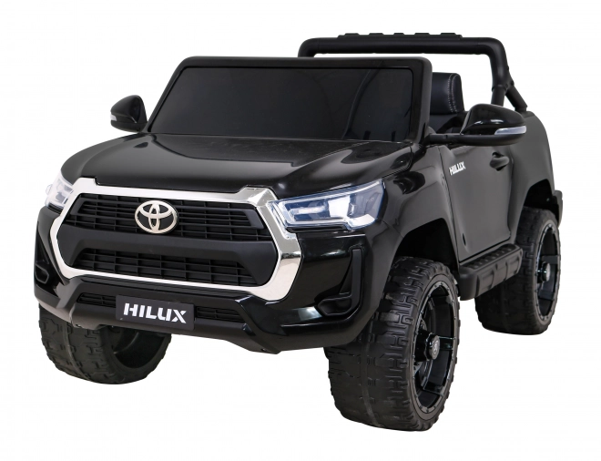 Toyota Hilux Batterie für Kinder schwarz + Antrieb 4x4 + Fernbedienung + 2 Gepäckträger + MP3-Radio + LED-Diode