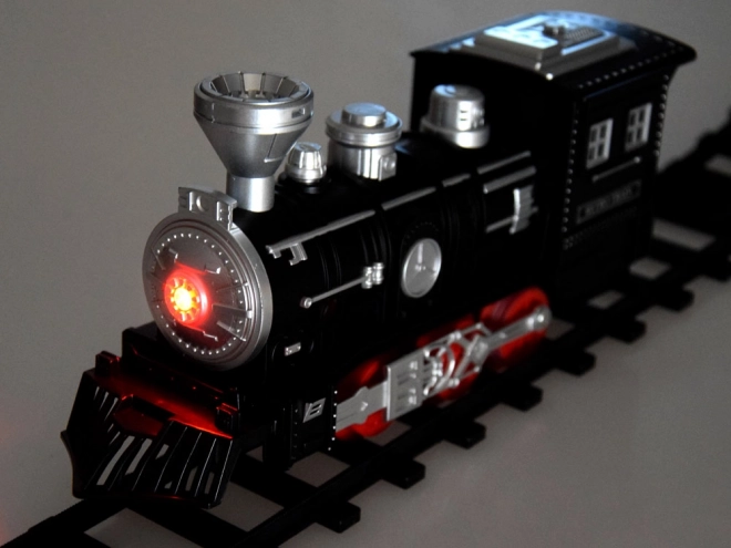 Dampflokomotive mit Zug und Licht