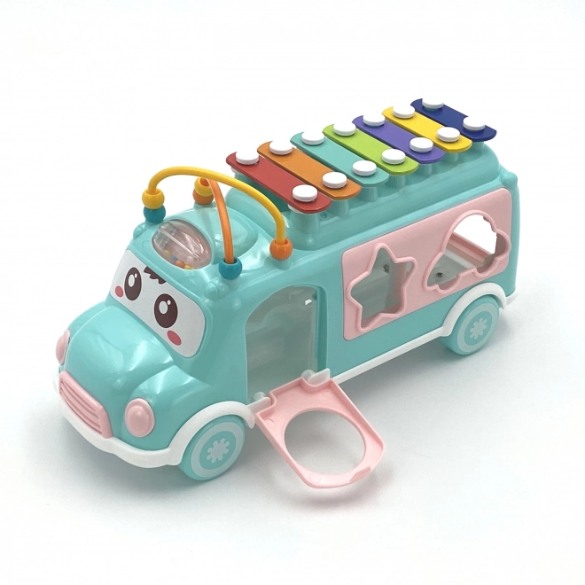 Woopie rosa Musikauto mit Sortierelementen und Zymbeln