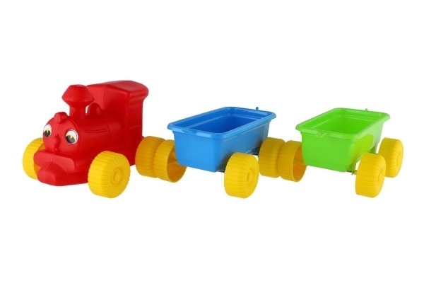 Plastikspielzeugzug mit 2 Waggons