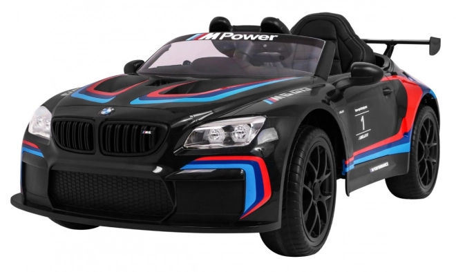 BMW M6 GT3 Spielzeugauto auf Batterie für Kinder schwarz + Belüftung + MP3-Sounds Lichter + Fernbedienung