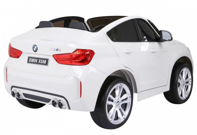 BMW X6M XXL pro 2 Kinder Weiß + Fernsteuerung + Eco-Leder + Sicherheitsgurte + langsamer Start + MP3 USB + LED