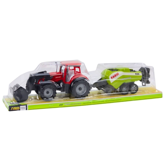 Roter Traktor mit Frontlader und Ballenpresse