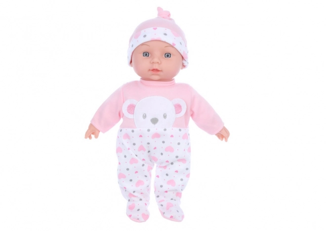 Babypuppe mit rosa Pyjama und Bärchenmütze mit Geräuschen