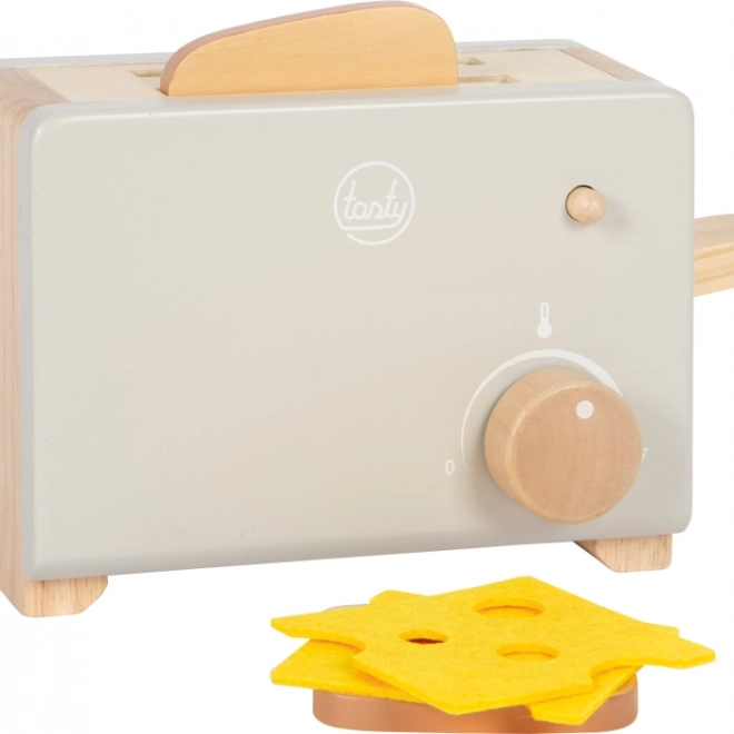Kleiner grauer Holztoster Tasty