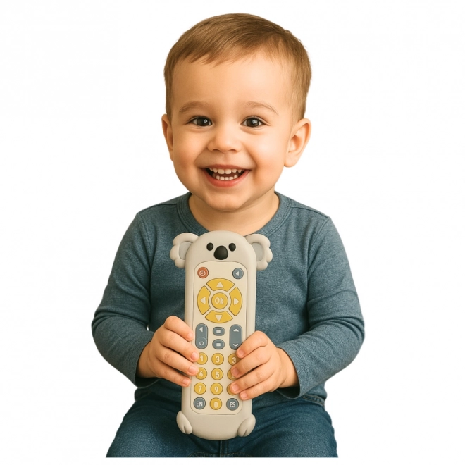 Interaktive Kinderfernbedienung mit einem Koala-Silikonbezug beige