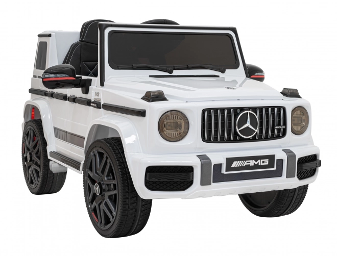 Mercedes AMG G63 für Kinder weiß + Fernbedienung + MP3 LED + langsamer Start + EVA + Gurte