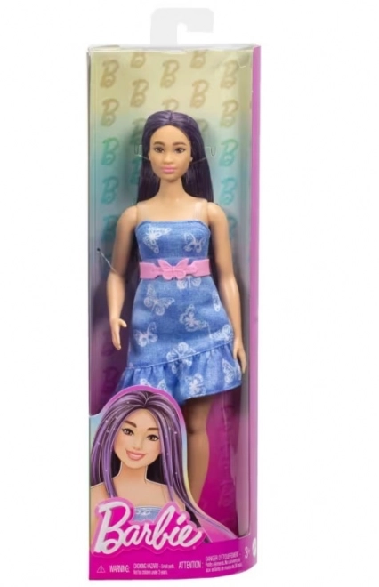 Barbie Puppe in blauen Kleidern mit Schmetterlingen