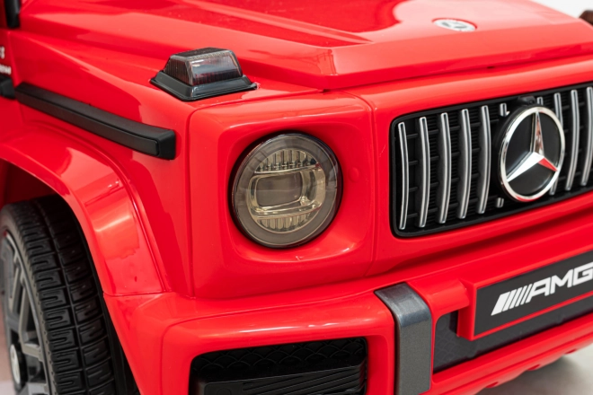 Mercedes AMG G63 für Kinder Rot + Fernbedienung + MP3 LED + Langsamer Start + EVA + Gurte