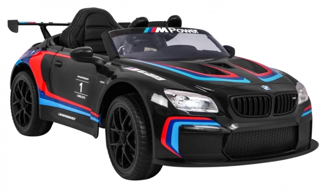 BMW M6 GT3 Spielzeugauto auf Batterie für Kinder schwarz + Belüftung + MP3-Sounds Lichter + Fernbedienung