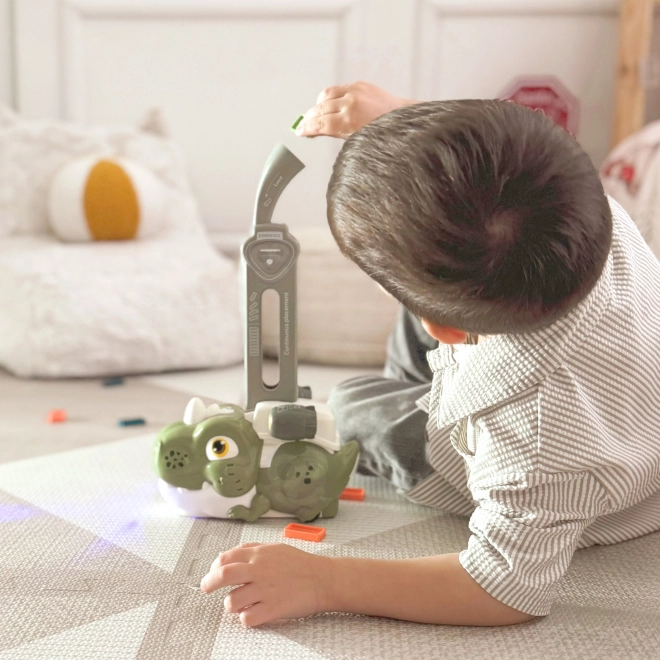 Interaktiver grüner Dinosaurier WOOPIE mit elektrischem Zug und Domino