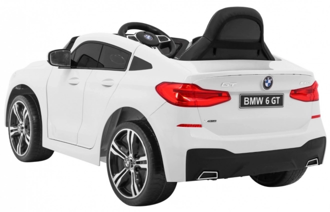 BMW 6 GT Weißes Auto mit Batterie + Fernbedienung + langsamer Start + EVA + Gurte + LED MP3