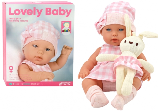 Baby Puppe mit Trage und Häschen in rosa kariertem Outfit