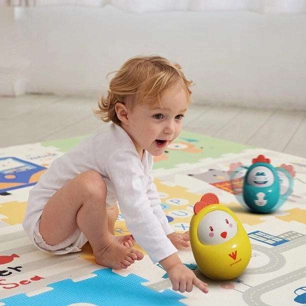 Dino Zauberwackel mit Musik für Babys