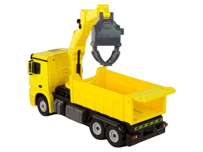 Mercedes Greifer-LKW von Rastar Gelb