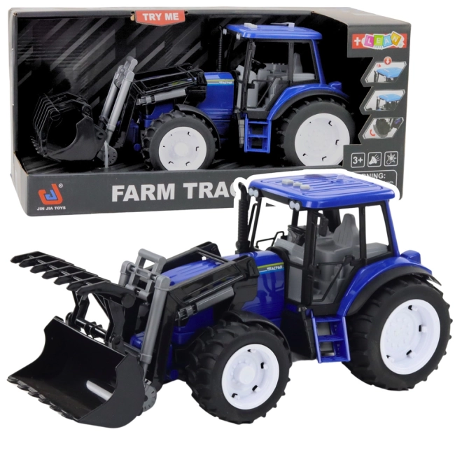 Kindlicher Traktor mit beweglicher Schaufel blau
