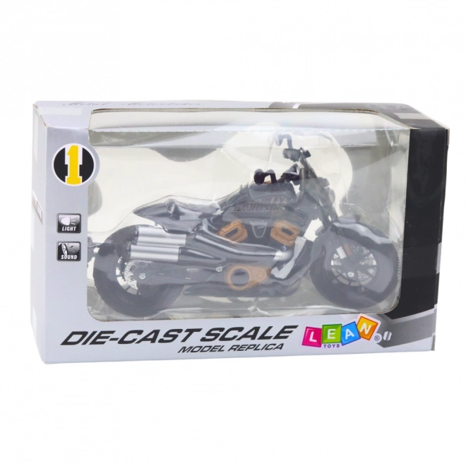 Schwarzes Chopper-Motorrad mit goldenen Akzenten 1:12