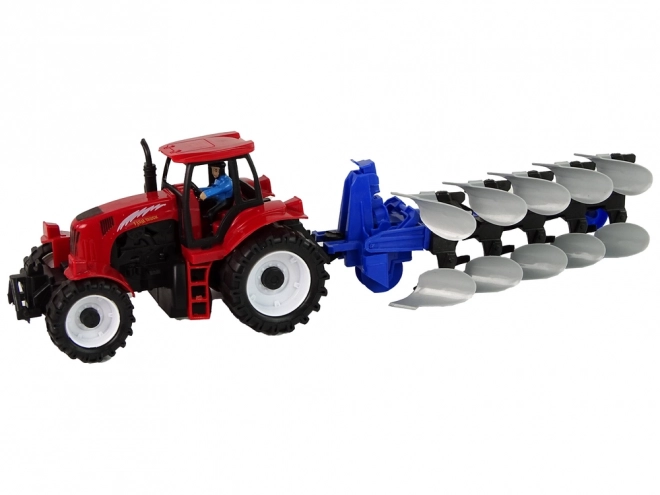 Roter Traktor mit Pflug Farm