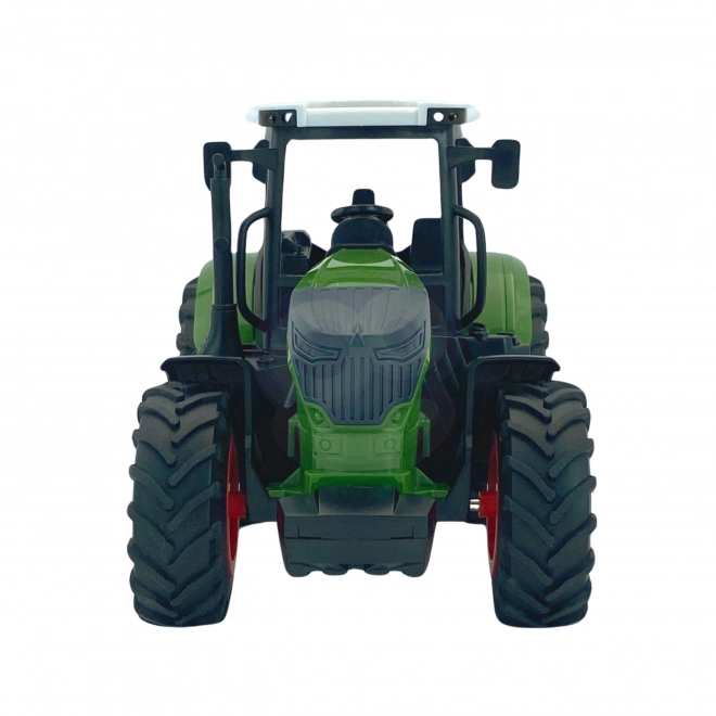 Traktor mit Gummirädern Grün