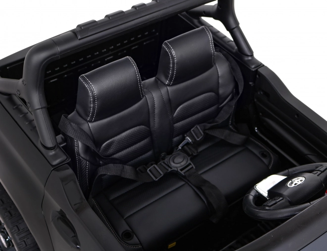 Toyota Hilux Batterie für Kinder schwarz + Antrieb 4x4 + Fernbedienung + 2 Gepäckträger + MP3-Radio + LED-Diode