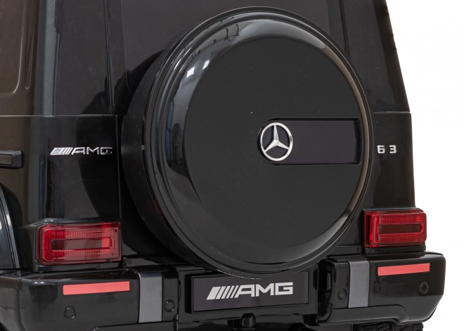 Mercedes AMG G63 für Kinder schwarz + Fernbedienung + MP3 LED + langsamer Start + EVA + Gurte