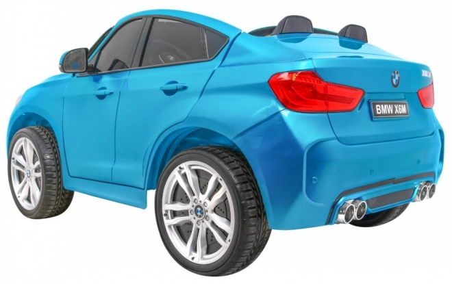 BMW X6M XXL pro 2 Kinder Blaue Farbe + Pilot + Eco-Leder + Sicherheitsgurte + Langsamer Start + MP3 + LED