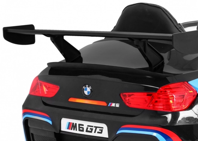 BMW M6 GT3 Spielzeugauto auf Batterie für Kinder schwarz + Belüftung + MP3-Sounds Lichter + Fernbedienung