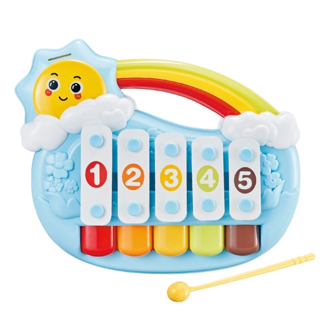 Blaues Kinderspielzeug-Klavier mit Sonnenmotiv