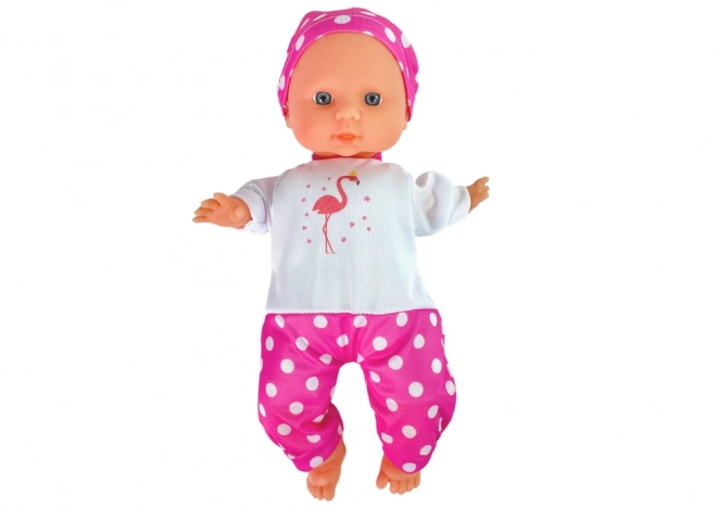 Baby-Puppe rosa Pyjama mit Punkten 30 cm