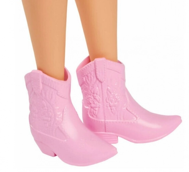 Barbie Puppe in blauen Kleidern mit Schmetterlingen