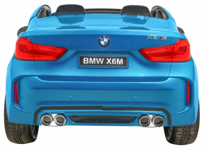 BMW X6M XXL pro 2 Kinder Blaue Farbe + Pilot + Eco-Leder + Sicherheitsgurte + Langsamer Start + MP3 + LED