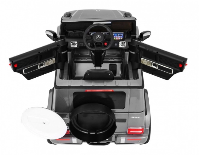 Mercedes AMG G63 für Kinder Silberlack + Fernbedienung + MP3 LED + langsamer Start + EVA + Gurte