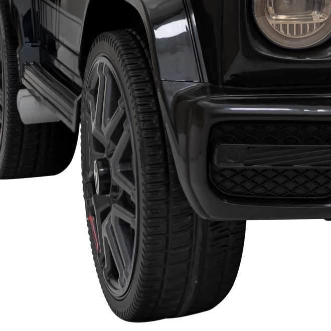 Mercedes AMG G63 für Kinder schwarz + Fernbedienung + MP3 LED + langsamer Start + EVA + Gurte