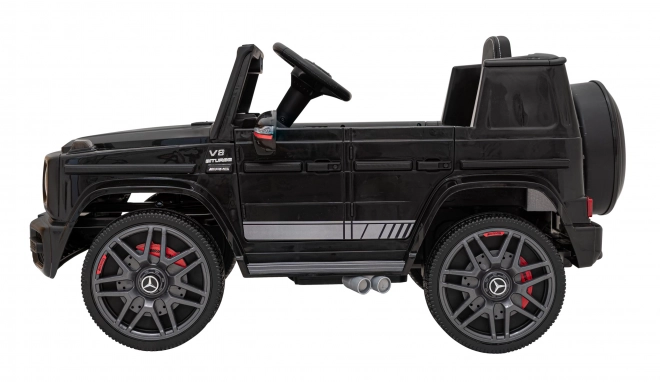 Mercedes AMG G63 für Kinder schwarz + Fernbedienung + MP3 LED + langsamer Start + EVA + Gurte