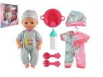 Babypuppe mit festem Körper und Zubehör, 25 cm