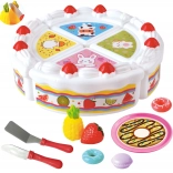 Woopie Geburtstagskuchen mit Obst und Süßigkeiten zum Schneiden