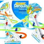 Pinguine auf beweglichen Treppen mit Licht und Melodien