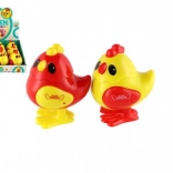 Hüpfendes Küken zum Aufziehen aus Kunststoff 7 × 9 cm, 2 Farben